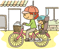 ヘルメットを着用した親子が自転車に乗っている写真