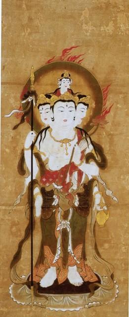 三つの顔を持ち左手に蓮華を持っている梵天の写真